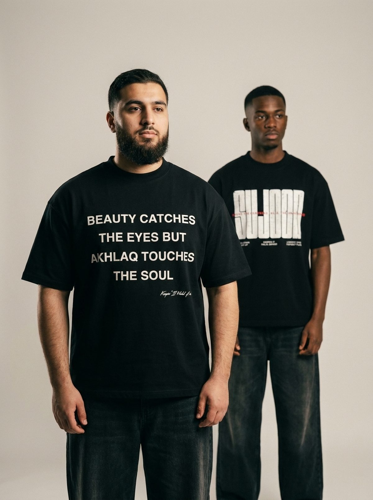 Akhlaq Over Beauty black tee, studio duo