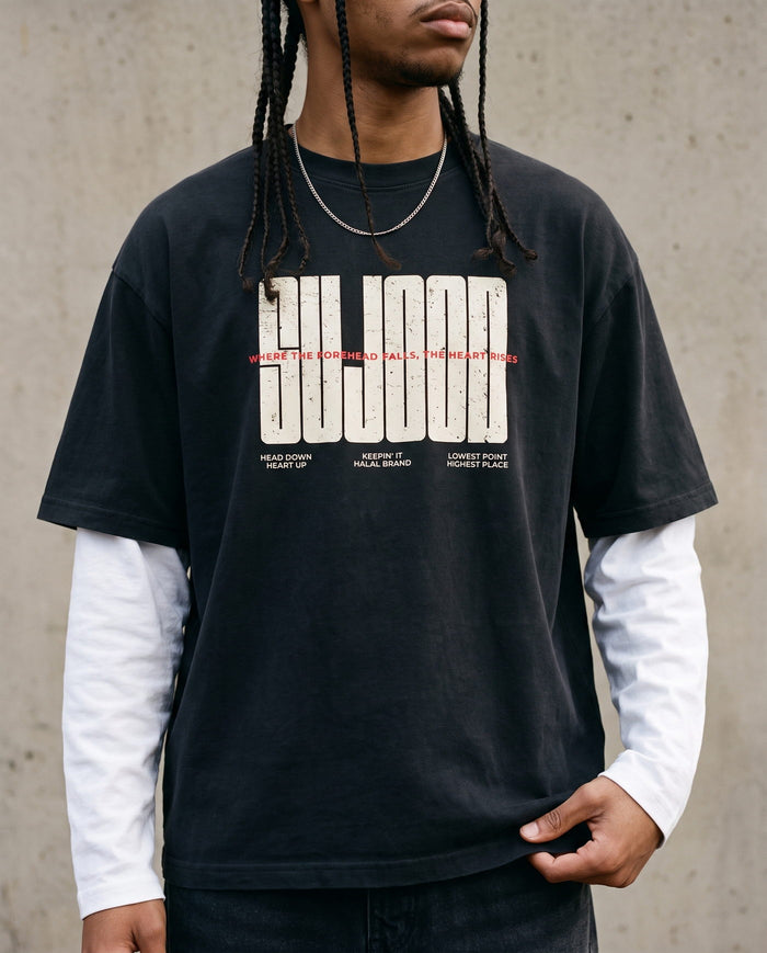 Sujood for the Heart black boxy tee front print in close detail