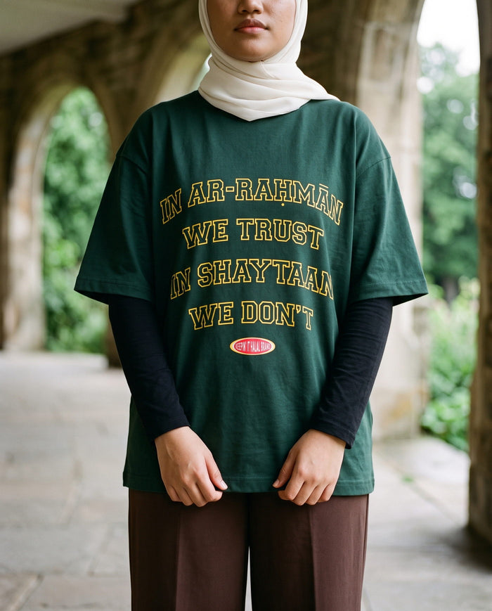 In Ar-Rahman We Trust forest boxy tee in a stone arcade