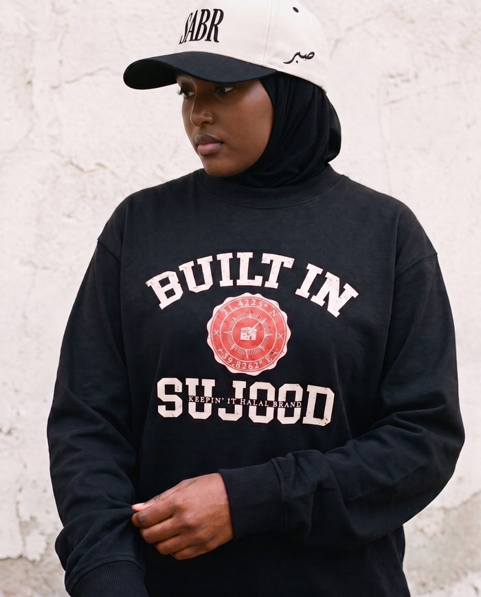 Built in Sujood black long sleeve front print in close detail